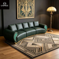 Canapé modulaire incurvé de luxe italien en cuir véritable vert foncé avec incrustations turquoise et base en métal doré pour salon de villa