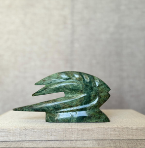 Hand-carved dark soapstone hippopotamus figurine decorated with <b>light</b> <b>leaf</b> motifs, available at wholesale prices. - Product Image 5
