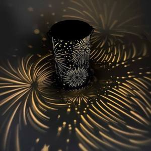 Elegante portavelas metálico que ofrece una luz de vela suave, creando una armonía tranquila en espacios interiores refinados. - Product Image 2