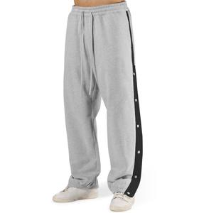 Pantalones de baloncesto transpirables de poliéster/algodón para hombre 2026 con cierre de botón y bolsillos laterales altos desmontables - Product Image 1