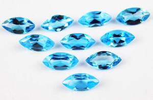 บลูโทแพซธรรมชาติจากสวิสทรงมาร์คีส์เจียระไนแบบเฟสเซต  ขนาดมาตรฐาน  พร้อมใบรับรอง  ไม่ผ่านการปรับแต่ง  พร้อมสำหรับการฝังในเครื่องประดับ - Product Image 2