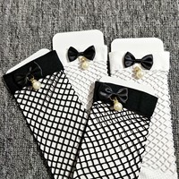 Chaussettes thermiques en laine mélangée de haute qualité pour femmes, mignonnes et épaisses, avec nœud en soie et breloque en perle, pour les fêtes d'hiver et l'usage quotidien