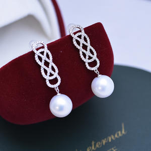 Boucles d'oreilles pendantes rondes blanches en argent 925 de 11-12 mm pour femmes, version coréenne, avec une forte brillance et des imperfections subtiles - Product Image 1