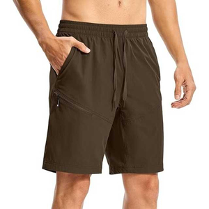 Shorts décontractés pour hommes à séchage rapide avec cordon de serrage et poches, couleur unie, en polyester tissé, taille mi-haute, longueur courte, nouveau design - Product Image 1