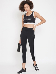 Soutien-gorge de sport dos nageur noir pour femme avec imprimé renforcé, respirant, maintien moyen, idéal pour le fitness et l'entraînement - Product Image 1