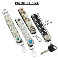 Porte-clés en cuir de vache véritable en gros pour femmes, porte-clés élégant en cuir de vache avec poils, porte-clés rustique occidental