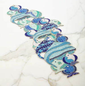 Playful multi-shade blue and teal schooling fish pattern handcrafted beaded <b>table</b> <b>runner</b>, available at wholesale prices. - Product Image 1
