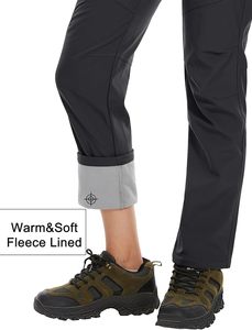 Pantalon de ski imperméable noir pour femme avec poches zippées et technologie Gore-Tex pour les activités de neige en plein air - Product Image 2