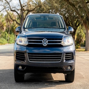 Toyota Land Cruiser 2013, Volkswagen Touareg TDI Lux 2011 - Product Image 1