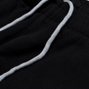 Pantalon de survêtement noir pour homme avec bande latérale blanche, taille élastique, décontracté, respirant, en toile imperméable et écologique, idéal pour l'hiver - Product Image 5
