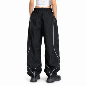 Pantalones de hombre a la moda, de alta calidad, con ribetes personalizados, logotipo bordado, holgados, impermeables, cortavientos, de poliéster, estilo baggy, de nailon, para deporte. - Product Image 3