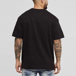 เสื้อยืดโอเวอร์ไซส์สีดำล้วน แขนสั้น ผ้าฝ้าย 100% สำหรับผู้ชาย รุ่นใหม่ล่าสุด รับสกรีนโลโก้ - Product Image 1