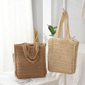 Acelera tu rutina con este moderno bolso de hilo natural con diseño de malla vertical y asas cómodas. - Product Image 2