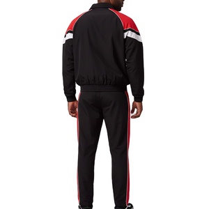 ชุดเซ็ทเสื้อแจ็คเก็ตและกางเกงขายาวผ้าฝ้าย 100% แบบมีซิป ลายโลโก้แบบกำหนดเอง สำหรับฤดูหนาว ดีไซน์แบบแพทช์เวิร์ค พรีเมียม กันลม - Product Image 2