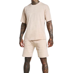 Tendance 2025 été col rond été à manches courtes costume hommes col rond couleur unie demi manches respirant ensemble pour homme - Product Image 1
