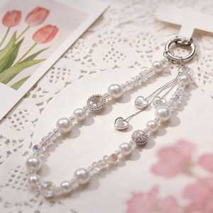Chaîne de téléphone portable à paillettes et perles, avec nœud et pompon, en cristal, courte, pour poignet, porte-clés en cristal - Product Image 1