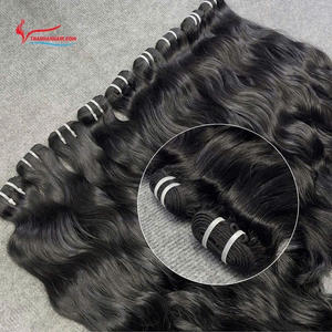 Precio al por mayor Extensiones de cabello ondulado natural de trama Colores negros Cabello humano vietnamita virgen 100% - Product Image 2