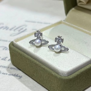 Boucles d'oreilles Saturne Zhuji Xijia 2025, perles d'eau douce sans noyau de 4-5 mm, bijoux en argent S925 tendance, perles sans noyau - Product Image 1