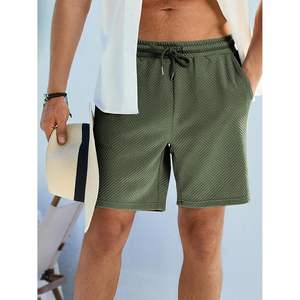 กางเกงขาสั้นลำลองผู้ชายแบบมีเชือกผูกเอว 7 นิ้ว สำหรับฤดูร้อน มีกระเป๋า ไซส์ XXS สีเข้ม ลายเทคนิค สไตล์สปอร์ต พร้อมโลโก้ - Product Image 1