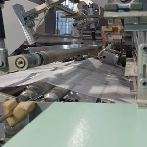 Machine entièrement automatique de fabrication de rouleaux de bandages en gaze - Product Image 2