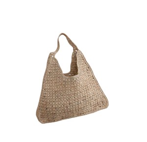 Adoptez le style estival pur avec ce sac élégant en fil naturel, doté d'un design tissé simple et d'une bandoulière confortable. - Product Image 1