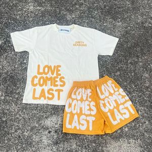 ชุดเซ็ตเสื้อยืดและกางเกงขาสั้นผู้ชายทรงหลวมสีพื้น ดีไซน์เรียบง่าย พร้อมซับในด้านหน้า ลดราคาสุดร้อนแรงช่วงซัมเมอร์ รับสั่งทำได้ - Product Image 5