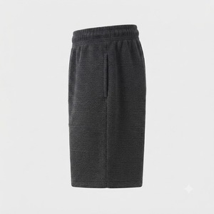 Shorts de survêtement en tricot noir pour homme, taille élastique avec cordon de serrage, coupe décontractée ample avec poches latérales, respirant, idéal pour l'été - Product Image 3