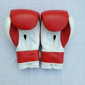 Gants de boxe professionnels en cuir véritable avec sangle de poignet, protection UV, couleur bleue personnalisable pour la pratique des arts martiaux - Product Image 6