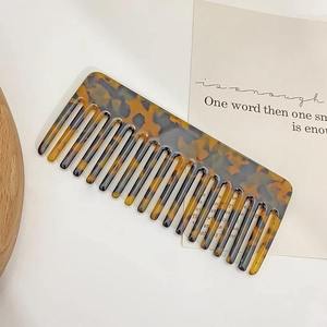 Peine de resina, el más vendido, utilizado para desenredar suavemente el cabello, distribuir los aceites naturales del cuero cabelludo y reducir la electricidad estática y el encrespamiento. - Product Image 5