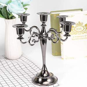 Premium Stainless Steel 4 Arm <b>Candle</b> Holder Decorative Candelabra for Dining Table and Home At <b>Cheap</b> Price - Product Image 1
