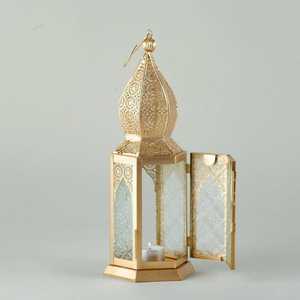 Golden <b>Brass</b> <b>Lantern</b> With Glass Panels And Intricate Cutout Design For Home Decoration - Product Image 1