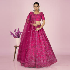 Ensemble Lehenga Choli en tulle avec jupe évasée à motifs brodés, chemisier assorti, et dupatta en tulle transparent doux et fluide - Product Image 1