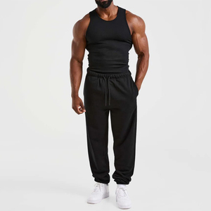 Nouveau pantalon de jogging décontracté pour homme en coton noir, avec logo personnalisé, taille élastique et cordon de serrage, en tissu tricoté, à prix bas - Product Image 3