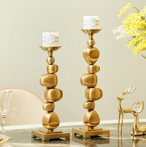 Fancy interlocking textured gold ring <b>candelabra</b> supporting three white spiral taper candles beautifully. Available at wholesale - Product Image 3