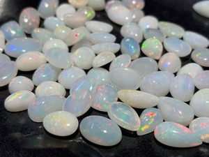 Ópalo Blanco de Etiopía Natural Certificado por Terceros, Precio al por Mayor, 3-5 Quilates, Forma Ovalada, Juego de Colores, Piedra de Nacimiento de Octubre - Product Image 1