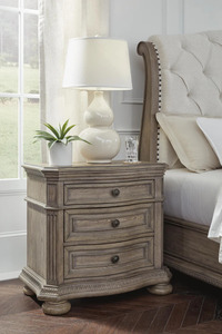 This is the Ashley Furniture Ardenfield 3 Drawer Nightstand featuring a light brown glazed antique look finish for bedroom use - Product Image 4
