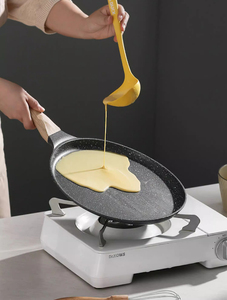 Tawa antiadherente con revestimiento de granito premium para cocinar sin aceite, con un diseño elegante y un cuerpo resistente. - Product Image 3