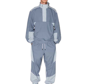Conjunto de Chaqueta y Pantalones Cortavientos Unisex Impermeables y Transpirables de Color Sólido para Invierno, con Logotipo Frontal - Product Image 4
