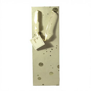 Bolsa de vino con asas de cinta de satén con estampado en lámina sobre papel hecho a mano con algodón reciclado para regalo de cumpleaños o aniversario. - Product Image 1