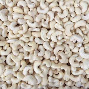 เม็ดมะม่วงหิมพานต์จากโรงงานที่เชื่อถือได้ SANTIGO Kaju Badam Nuts Kernels Cashew Nuts รับผลิตแบบ OEM, ODM พร้อมบรรจุภัณฑ์ - Product Image 1