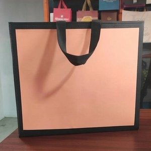 Bolsa de papel personalizada con logotipo al por mayor para tiendas de ropa, supermercados, embalaje de regalos y venta al por menor - Product Image 1