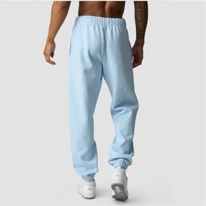 Pantalones deportivos de algodón orgánico Arctic Blue con bolsillos laterales abiertos, cintura ajustable con cordón, longitud completa con puños en las piernas. - Product Image 2