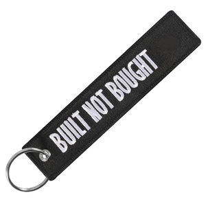 Llavero de tela bordado a doble cara de alta calidad con diseño clásico de cerdo, técnica tejida - Product Image 4