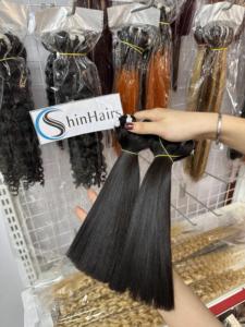 Top 2024 cheveux bruts en gros os droit naturel noir couleur vietnamien vierge faisceaux de cheveux humains extensions de trame - Product Image 5