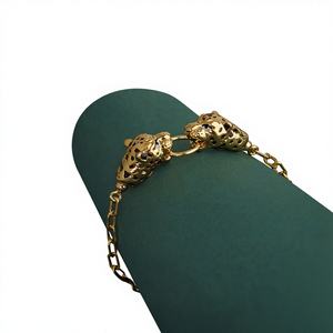 22K <b>Solid</b> <b>Gold</b> Baby <b>Bracelet</b> Featuring Handcrafted Twin Lion Head Design on Durable Black Cord for Kids and Toddler - Product Image 1