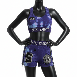 Conjunto de shorts para mujer de poliéster y elastano con efecto tie-dye morado y azul, paneles cosidos, cremallera y logo bordado. - Product Image 1