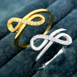 Anillo de compromiso y aniversario de boda de plata de ley 925 con circonita cúbica y diseño de infinito cruzado, deslumbrante y moderno para mujer, 0.10 - Product Image 3