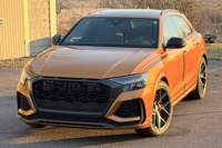 Audi RS Q8 2023 d'occasion en excellent état, 591 ch, V8 biturbo, transmission intégrale, couleur orange dragon métallisé, très bien équipée