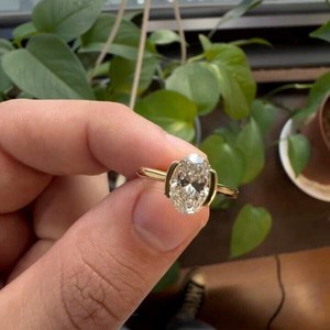 แหวนเพชรทรงรีเพาะเลี้ยงในห้องปฏิบัติการ ประดับเพชรเม็ดเดี่ยวแบบครึ่งขอบ สำหรับผู้หญิง ทองคำแท้ 14K เครื่องประดับแต่งงานทันสมัยสำหรับคู่รัก - Product Image 5