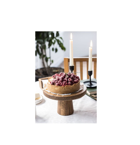 Wooden cake stand for <b>displaying</b> desserts at rustic weddings with handcrafted natural finish and elegant round base - Product Image 1
